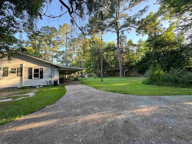 view of yard with a carport