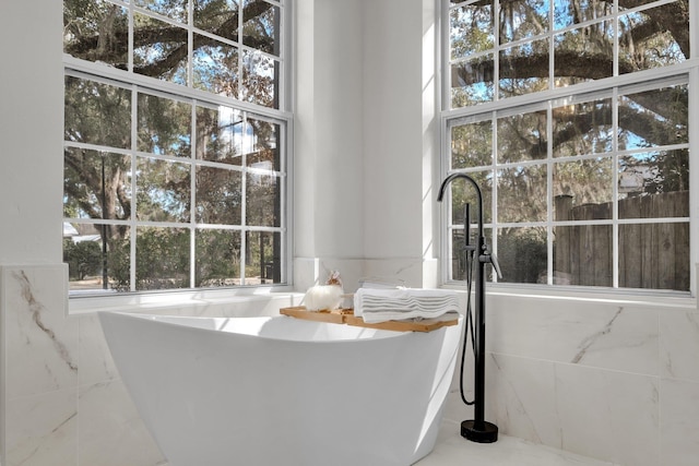 bathroom featuring a bath