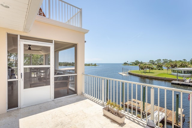 balcony featuring a water view