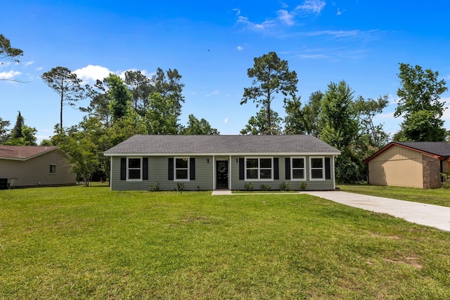 2328 Southampton Dr, Tallahassee, FL 32311 - ranch-style house with a front yard, concrete driveway, and roof with shingles
