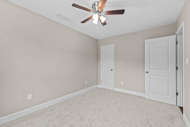2328 Southampton Dr, Tallahassee, FL 32311 - unfurnished bedroom featuring light carpet, baseboards, and ceiling fan