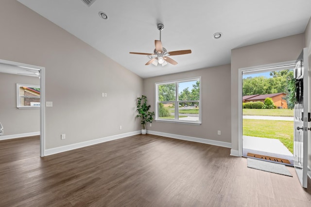 2328 Southampton Dr, Tallahassee, FL 32311 - empty room with a ceiling fan, baseboards, dark wood-type flooring, vaulted ceiling, and recessed lighting