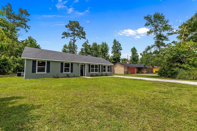 2328 Southampton Dr, Tallahassee, FL 32311 - ranch-style house with driveway, a front yard, and central AC