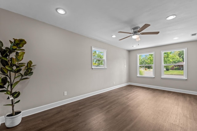 2328 Southampton Dr, Tallahassee, FL 32311 - empty room with dark wood-style flooring, baseboards, a ceiling fan, and recessed lighting