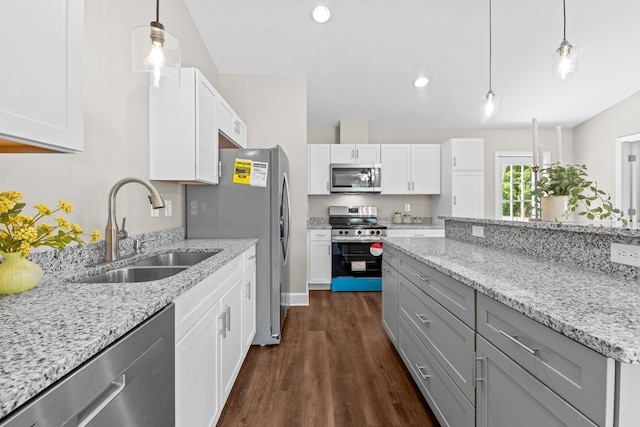 2328 Southampton Dr, Tallahassee, FL 32311 - kitchen with stainless steel appliances, a sink, dark wood-style flooring, white cabinetry, and recessed lighting