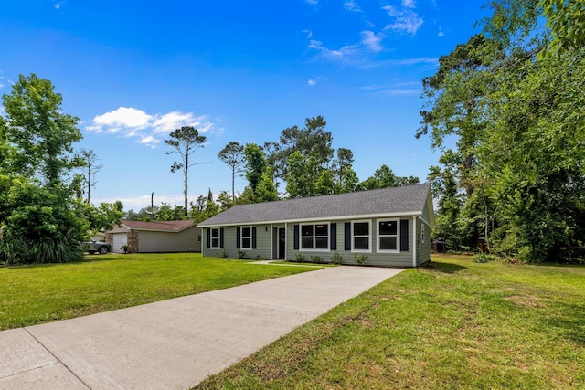 2328 Southampton Dr, Tallahassee, FL 32311 - ranch-style house with a front yard and concrete driveway