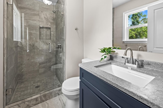 2328 Southampton Dr, Tallahassee, FL 32311 - full bath with toilet, vanity, a stall shower, and marble look tile flooring
