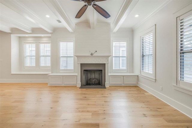 unfurnished living room featuring crown molding, visible vents, light wood-type flooring, beamed ceiling, and baseboards