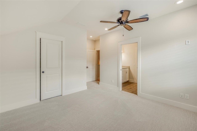 unfurnished bedroom with recessed lighting, light colored carpet, visible vents, and baseboards