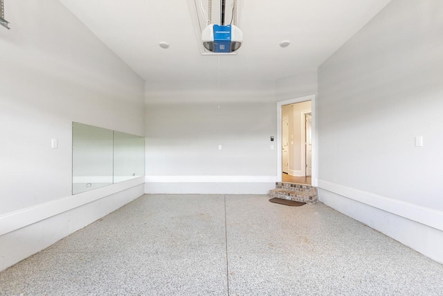 712 Sydney Dr, Tallahassee, FL 32317 - garage with a garage door opener and baseboards
