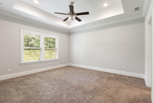 712 Sydney Dr, Tallahassee, FL 32317 - carpeted spare room featuring a raised ceiling, ornamental molding, a ceiling fan, baseboards, and recessed lighting