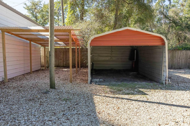 view of parking / parking lot featuring a carport