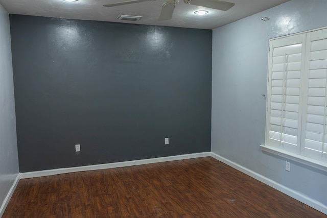 spare room featuring ceiling fan and wood-type flooring