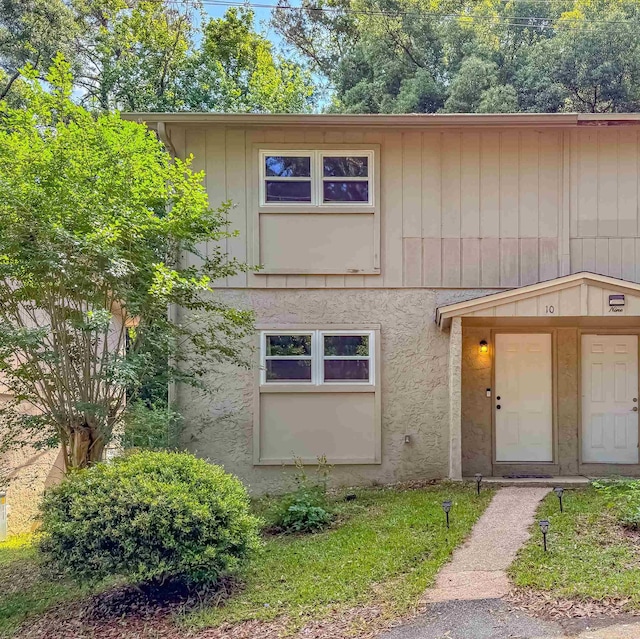 1520 Pullen Rd, Tallahassee, FL 32303 - view of front of home featuring stucco siding