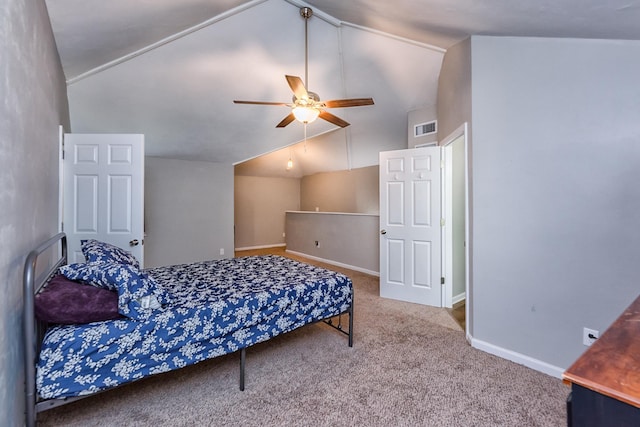 bedroom with lofted ceiling, ceiling fan, and carpet flooring