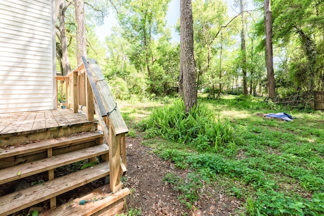 view of yard featuring a deck