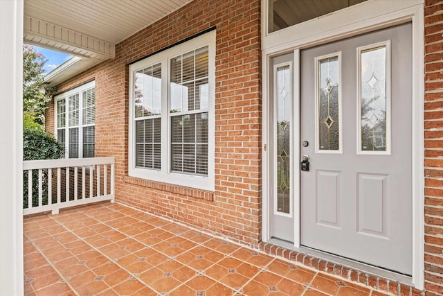 entrance to property with covered porch