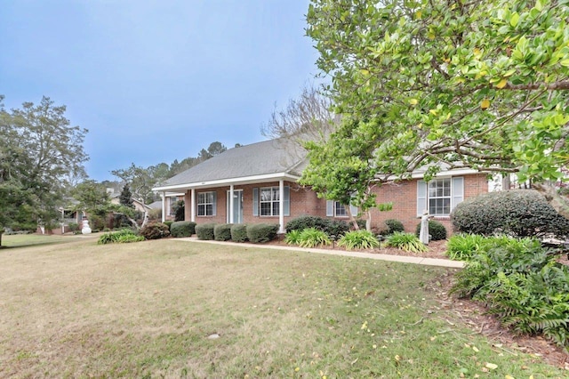 view of front of home with a front lawn