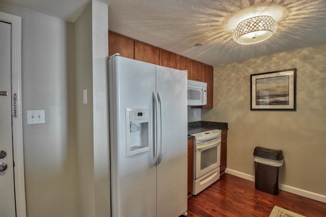 300 S Duval St Unit 1411, Tallahassee, FL 32301 - kitchen featuring dark hardwood / wood-style flooring, a textured ceiling, and white appliances