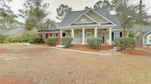 craftsman-style house featuring covered porch