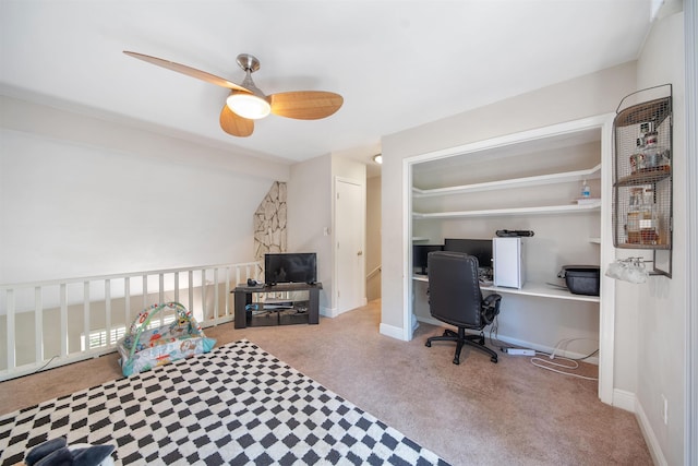 carpeted bedroom featuring a ceiling fan and baseboards