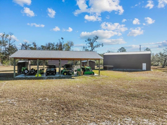 view of yard featuring a carport