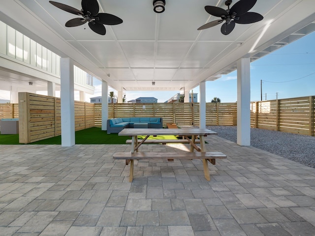 view of patio with ceiling fan