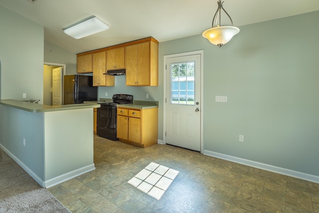 kitchen featuring lofted ceiling, pendant lighting, kitchen peninsula, and black appliances