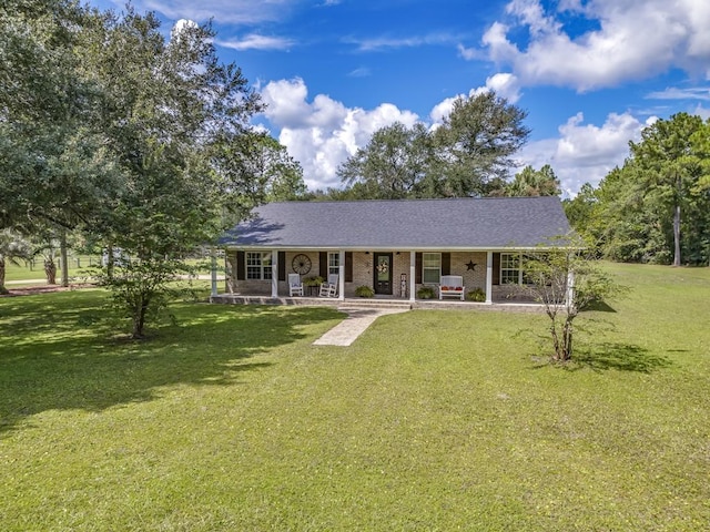 view of front facade with a front lawn and a porch