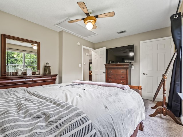 bedroom featuring light carpet and ceiling fan