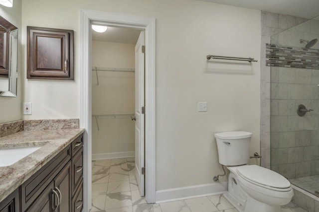 1178 Robin Kay Rd, Tallahassee, FL 32312 - full bath with marble look tiles, vanity, a shower stall, and a spacious closet