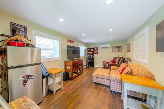 1178 Robin Kay Rd, Tallahassee, FL 32312 - living area with wood finished floors, a wall mounted AC, and recessed lighting