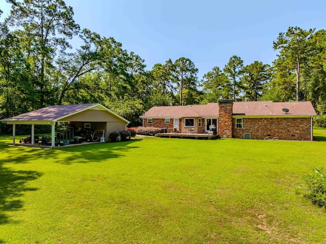 1178 Robin Kay Rd, Tallahassee, FL 32312 - view of green lawn featuring a deck