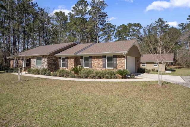 1178 Robin Kay Rd, Tallahassee, FL 32312 - view of front of property featuring driveway, a front lawn, a garage, brick siding, and a shingled roof