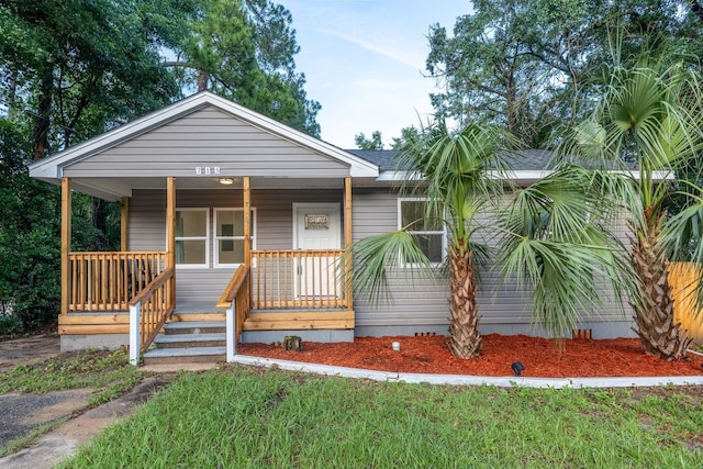 715 Caliark St, Tallahassee, FL 32304 - bungalow featuring a porch