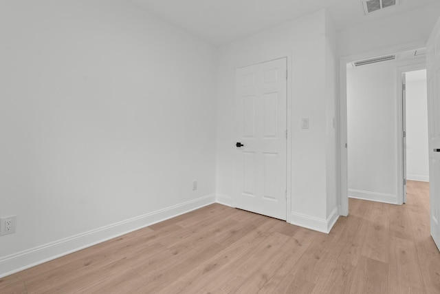 715 Caliark St, Tallahassee, FL 32304 - unfurnished bedroom featuring light wood finished floors and baseboards