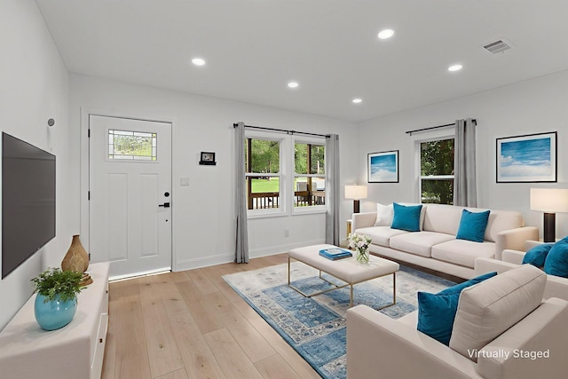715 Caliark St, Tallahassee, FL 32304 - living area featuring healthy amount of natural light, light wood-style floors, and recessed lighting
