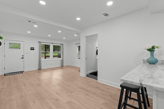 715 Caliark St, Tallahassee, FL 32304 - foyer with light wood-style floors and recessed lighting