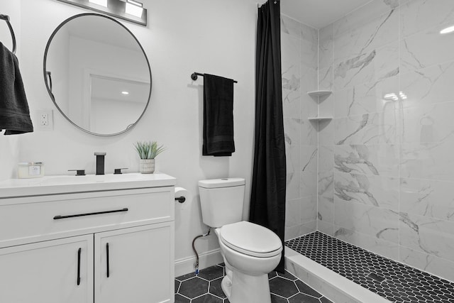 715 Caliark St, Tallahassee, FL 32304 - bathroom featuring vanity, a tile shower, and tile patterned floors