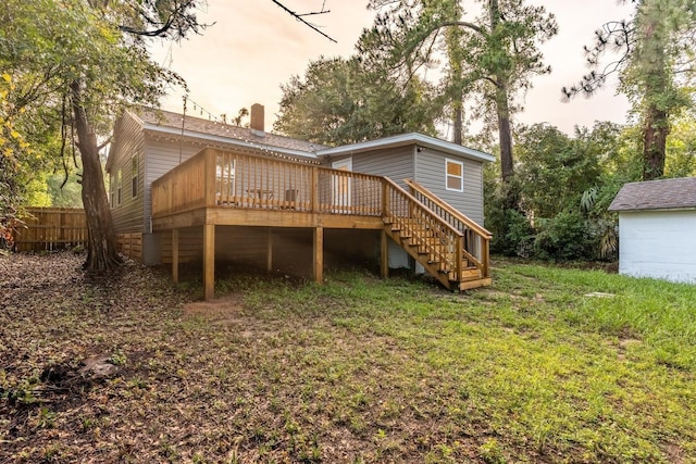 715 Caliark St, Tallahassee, FL 32304 - back of property featuring a wooden deck and stairway
