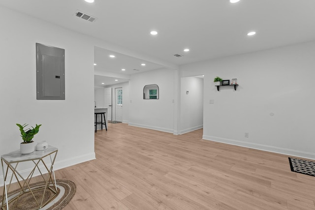 715 Caliark St, Tallahassee, FL 32304 - unfurnished room with electric panel, recessed lighting, and light wood finished floors