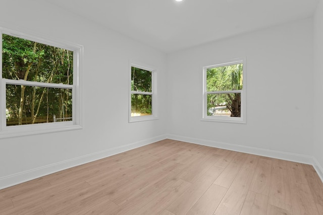 715 Caliark St, Tallahassee, FL 32304 - spare room featuring light wood-style flooring and baseboards