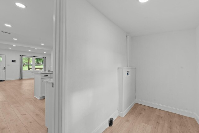 715 Caliark St, Tallahassee, FL 32304 - laundry room featuring recessed lighting and light wood-style floors