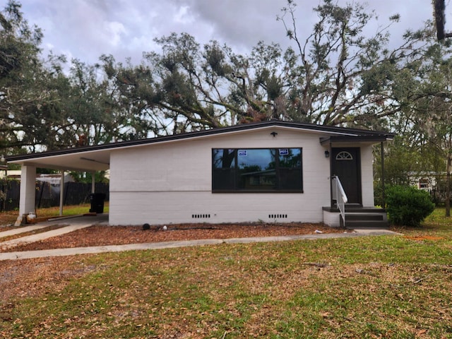 view of front facade featuring a carport