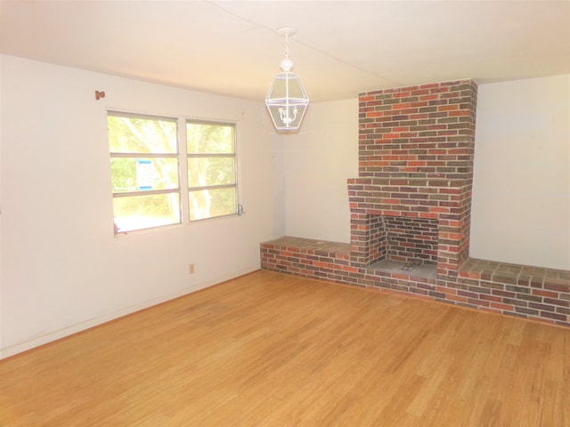 906 NE 1st St, Havana, FL 32333 - unfurnished living room with wood finished floors