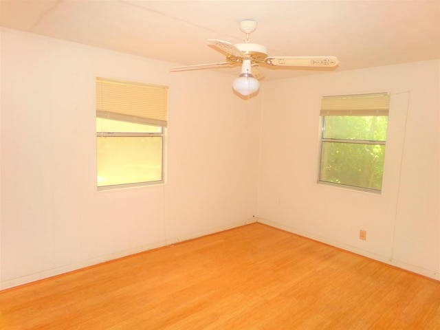 906 NE 1st St, Havana, FL 32333 - unfurnished room with light wood finished floors and a ceiling fan