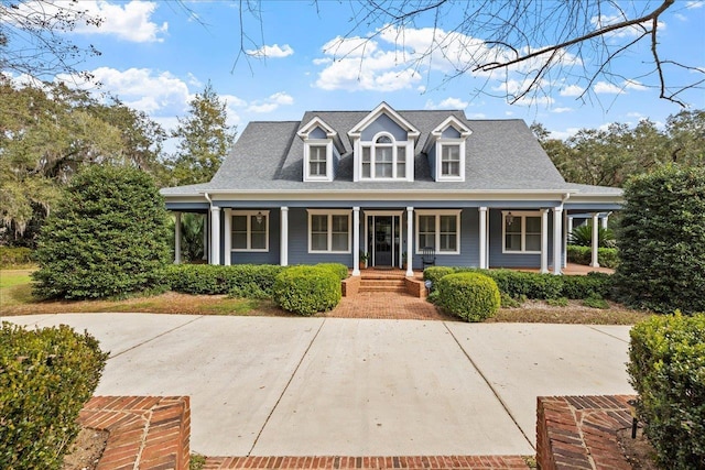 cape cod house with covered porch