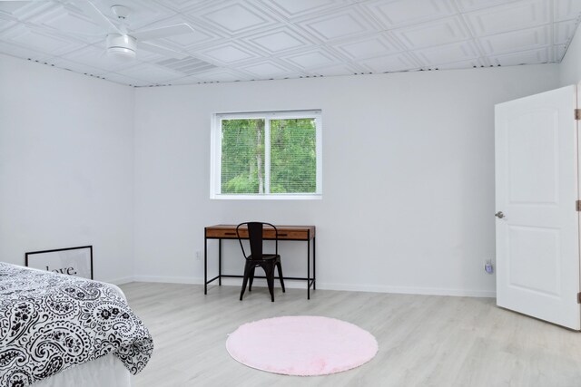 bedroom featuring light wood-type flooring and ceiling fan