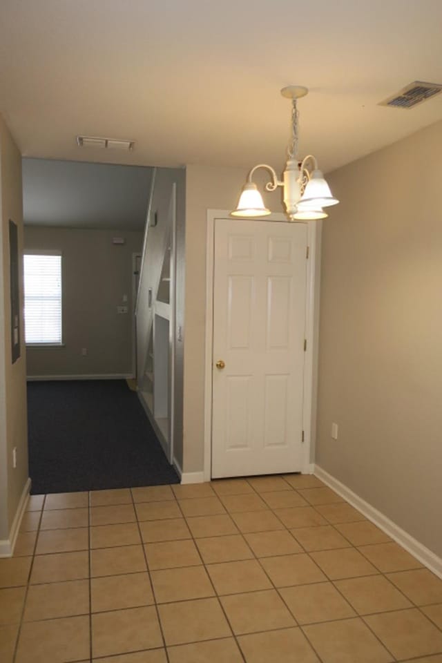 interior space with a notable chandelier