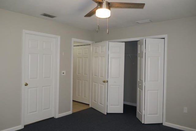 unfurnished bedroom featuring ceiling fan